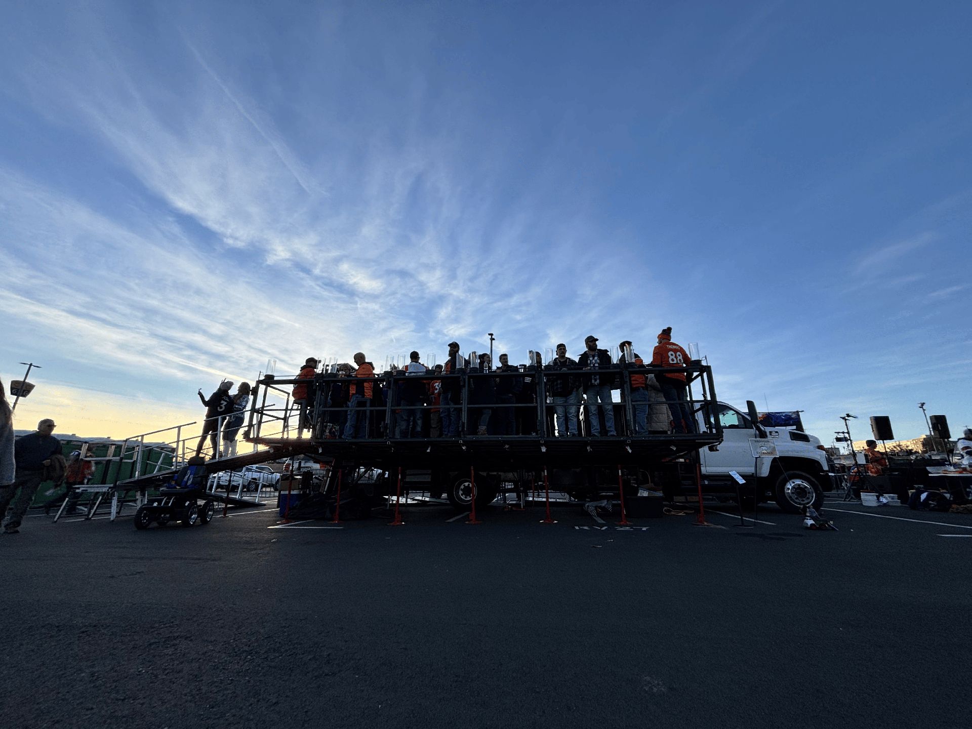Tailgate event with people smiling